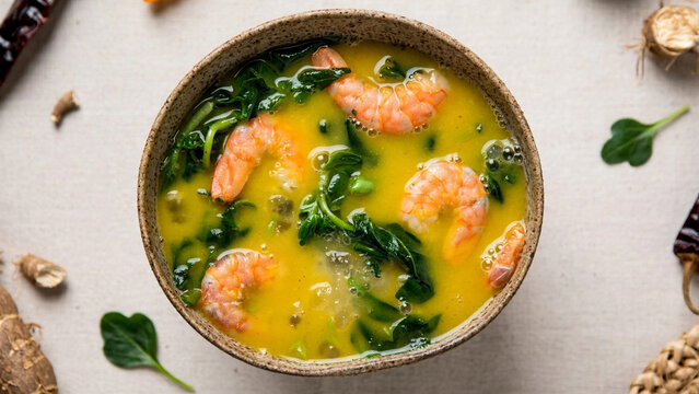 Tacaca Brazilian amazonian soup with shrimp jambu tucupi leaf ceramic
