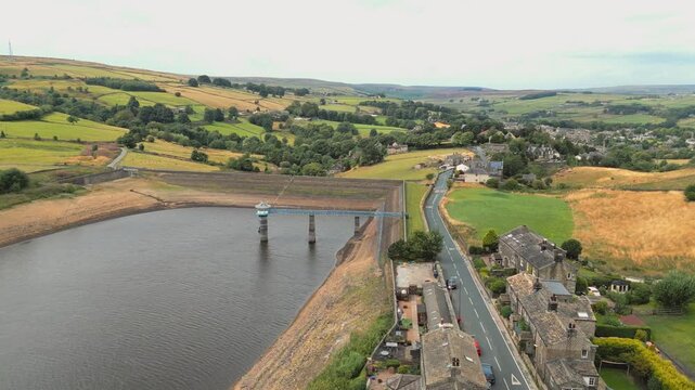 Aerial view of a quiet rural reservoir. Leeming_Village, Halifax, West Yorkshire, Wind Farm, turbines,
