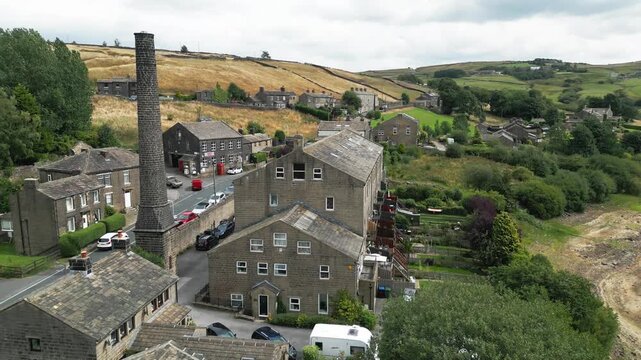 Cars rest idle at. Leeming_Village, Halifax, West Yorkshire, Wind Farm, turbines,