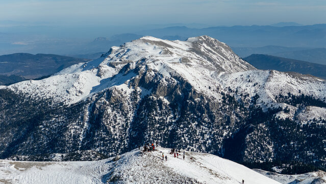 Aerial view of snowy Mount Zireia summit in Corinthia, Greece, Mount Kyllini