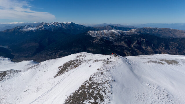 Aerial view of snowy Mount Zireia summit in Corinthia, Greece, Mount Kyllini