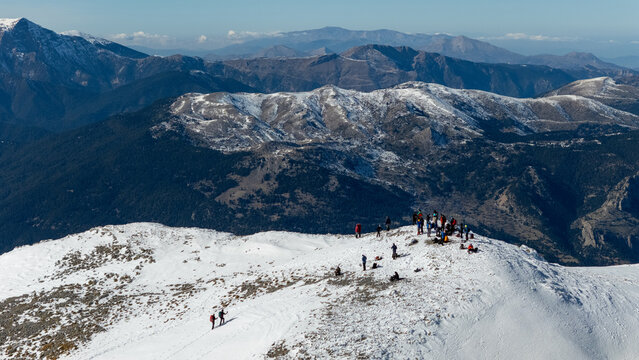Aerial view of snowy Mount Zireia summit in Corinthia, Greece, Mount Kyllini