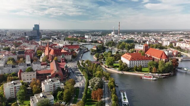Aerial view of Wrocław with Oder river, Sand Island and Sky Tower in autumn, Poland