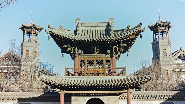 Traditional Chinese Architecture with Twin Towers and Ornate Gate in Xi an, China