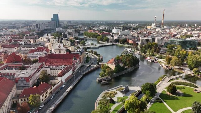 Aerial view of Wrocław city center with Oder river islands, historic buildings and Sky Tower skyline, Poland