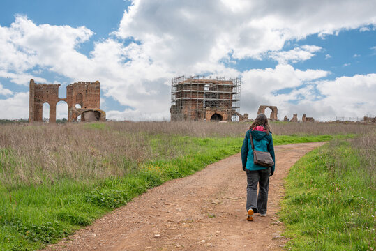 A Young Woman Walking Along a Path Toward the Villa dei Quintili, Rome