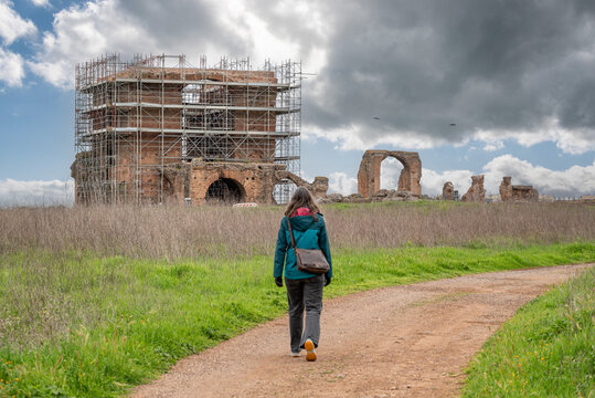A Young Woman Walking Along a Path Toward the Villa dei Quintili, Rome