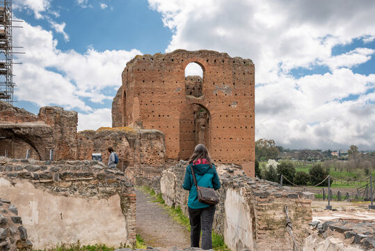 Female Tourist Approaching the Calidarium at Villa dei Quintili Rome