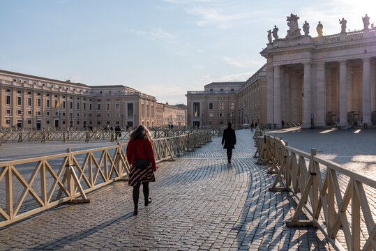Woman Walking Across St Peters Square Early Morning Rome