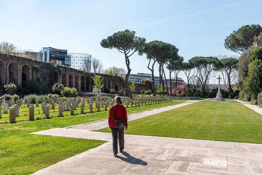 Woman Walking Towards British War Cemetery Graves, Rome