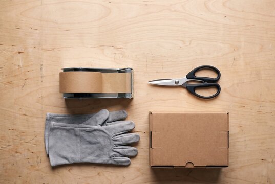Reverse logistics repackaging toolkit on a birch workbench