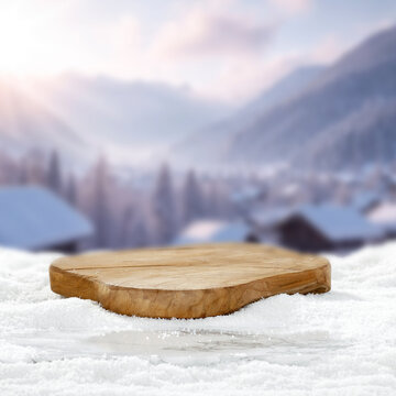 Winter product mockup with copy space &ndash; snowy mountain landscape and product placement. Clean space for product placement surrounded by fresh snow. Winter template for commercial campaigns.