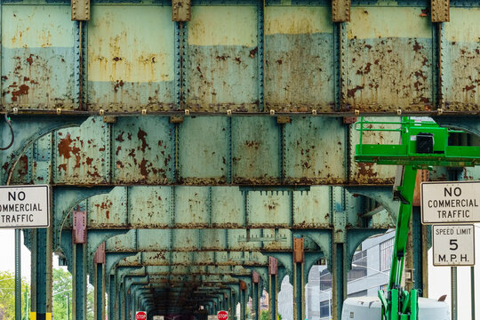 Weathered MTA Elevated Railway Structure with Rusted Steel in New York City