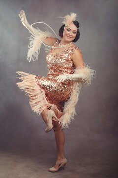 1920s Flapper Woman in Sequin Fringe Dress Dancing Charleston - Great Gatsby Style