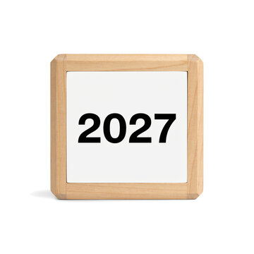 Wooden desk block calendar showing 2027