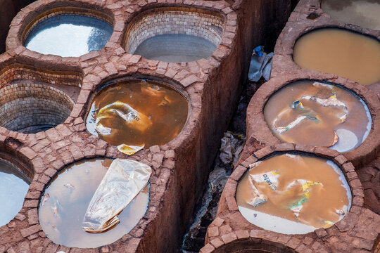 Close-Up of Round Stone Tanning Vats in Fes Tanneries   
Morocco 