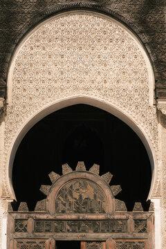 ecorations inside the historic Al-Attarine Madrasa courtyard in Fes, Morocco