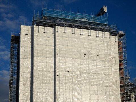 UK, England, scaffolding on apartment block