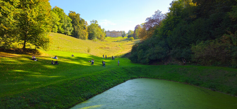 Visitors Relaxing in Prior Park Landscape Garden Near Bath England