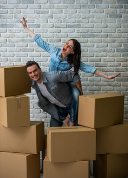 Playful Moving Couple.