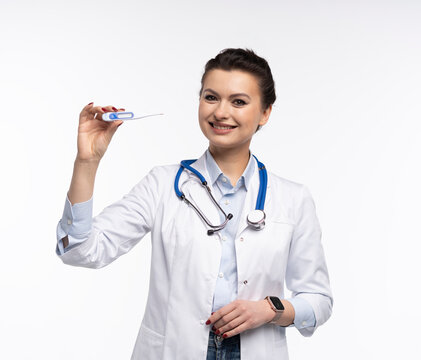 Attractive woman qualified specialist therapist wear white doctor robe hand hold pills isolated on white background.