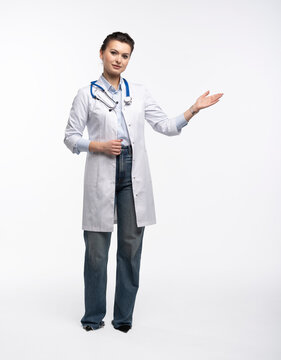 Medical doctor woman presenting and showing copy space for product or text