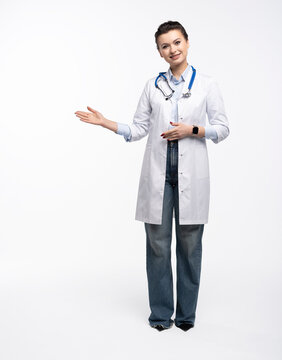 Medical doctor woman presenting and showing copy space for product or text