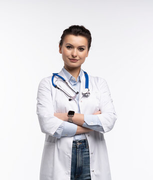 Portrait of pretty positive lady doctor with empty space blank isolated on white background.