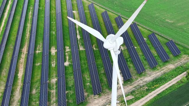 Wind turbine and solar panel farm aerial photography