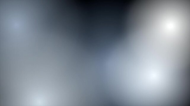 Abstract dark blue and grey gradient background with soft light flares and smooth transitions