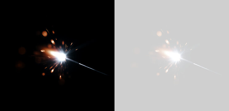 Burning sparkler in the dark: golden sparks, a bright glow, and a festive New Year's effect.