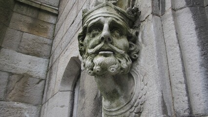 Fototapeta premium Carved stone face detail at Westminster Abbey in London