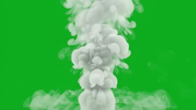 Volumetric white smoke plume rising continuously on chroma key green screen