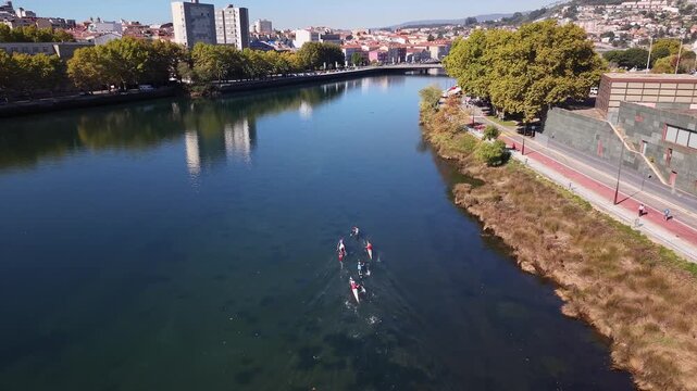 Aerial drone shot showing the city of pontevedra, the l&eacute;rez river, and the tirantes bridge in galicia