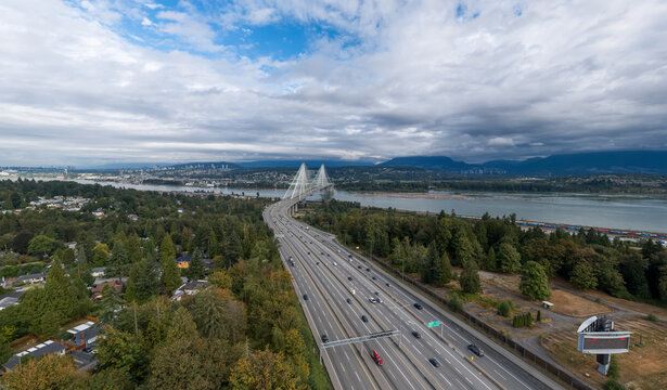 Aerial View Of Highway 1 And Cable-Stayed Bridge Over River Near Surrey Vancouver BC