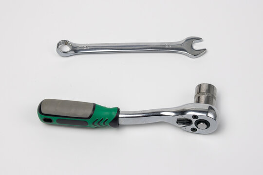 Spanner and ratchet wrench tools on white background