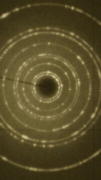 X-ray powder diffraction Debye rings rotating crystal grain texture dark detector seamless loop in cool black tones vertical 9:16