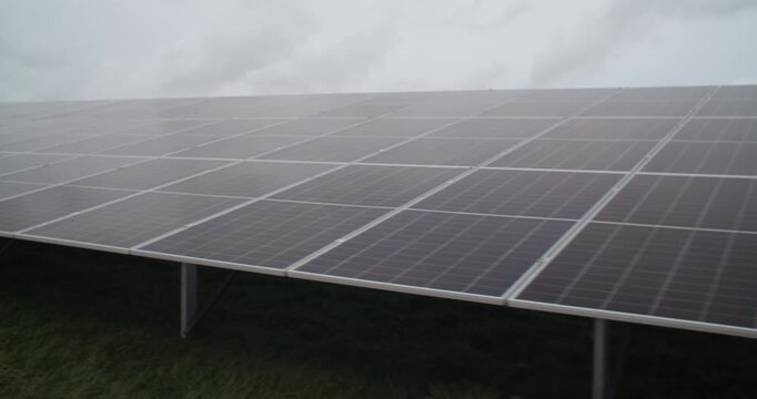 Solar Panel Array panels tilted to sun long rows solar energy farm