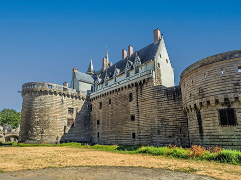 Nantes, France, Europe - August 7, 2026: Ch&acirc;teau des ducs de Bretagne, Castle of the Dukes of Brittany. SW Bastion or circular defensive tower along the ramparts with Battlement and parapet on top. Mo