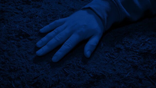 Arm On The Ground At Night