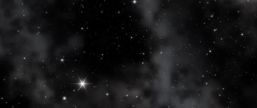 Starfield glimmers as soft gray clouds drift across a dark, expansive night sky