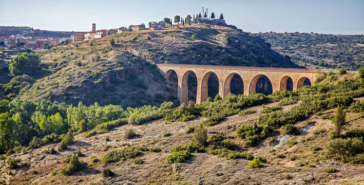 Historic Ojos Negros Greenway viaduct and Albentosa village, Teruel, Spain