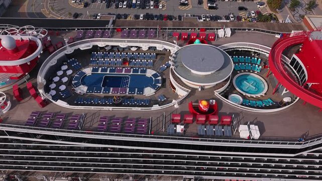 Drone footage of Halifax Harbour featuring several large cruise ships berthed at the Port of Halifax, Nova Scotia, Canada, during the peak summer cruise season.
