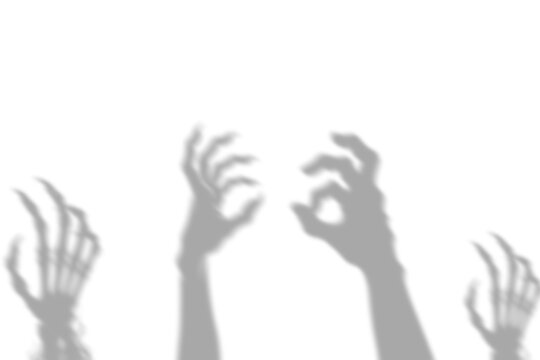 Shadow overlay effect for halloween background with terrifying scary hands reaching out in a dark and spooky atmosphere presented as an isolated on transparent background
