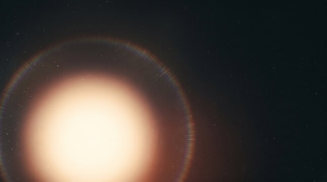 Lens flare with chromatic aberration glows against a dark background