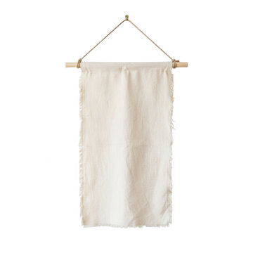 Off-white linen fabric banner hanging on a wooden dowel and rope