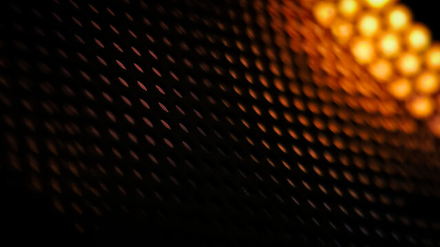 Dark Grid with Glowing Orange Bokeh Lights Background