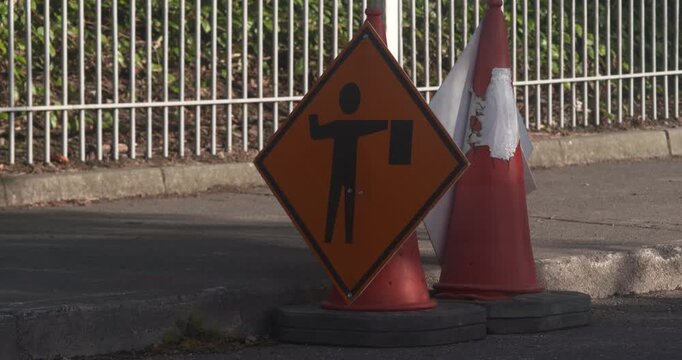 Road traffic hazard warning sign maintenance road crew workers ahead