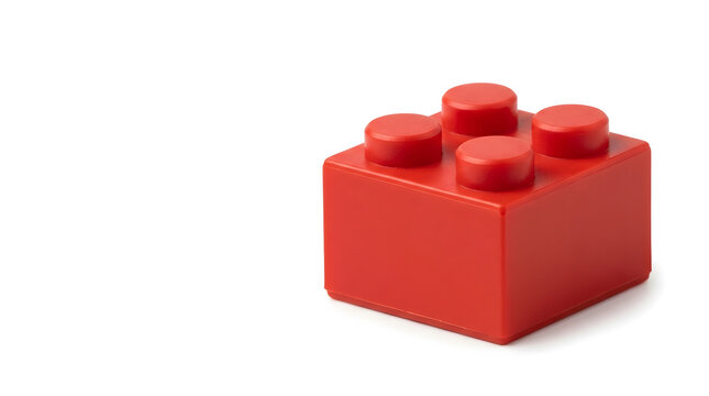 Bright modular red building block with interconnected studs, concept for agile project management, team collaboration, and scalable business solutions