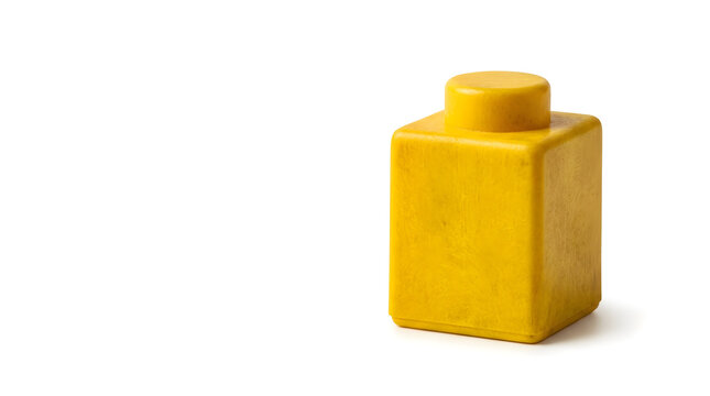 Bright yellow modular block arrangement on clean white background, concept for agile project management, team collaboration and innovative business solutions